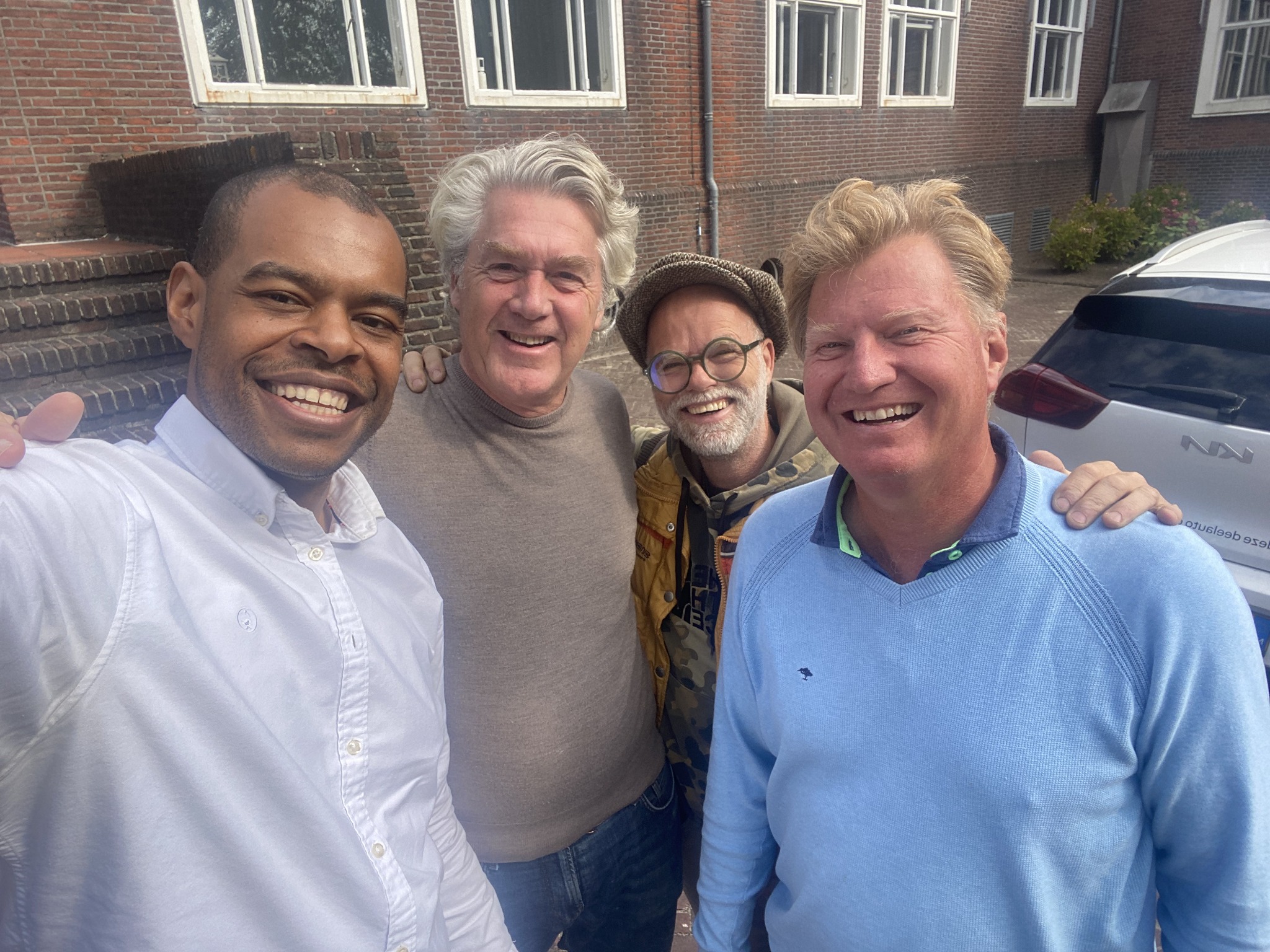 Freddie with colleagues at a formal event