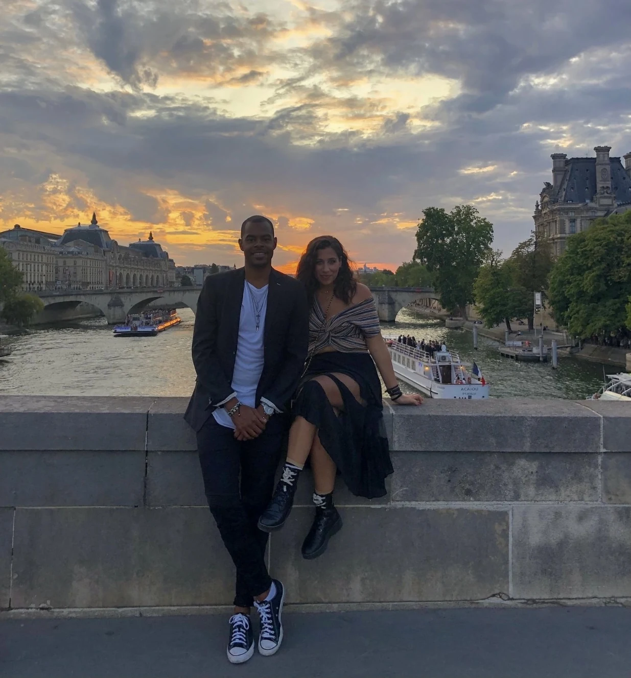 Freddie with a friend on a bridge over the Seine